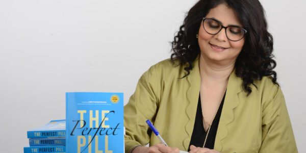 Gauri Chaudhari holding her book 'The Perfect Pill'