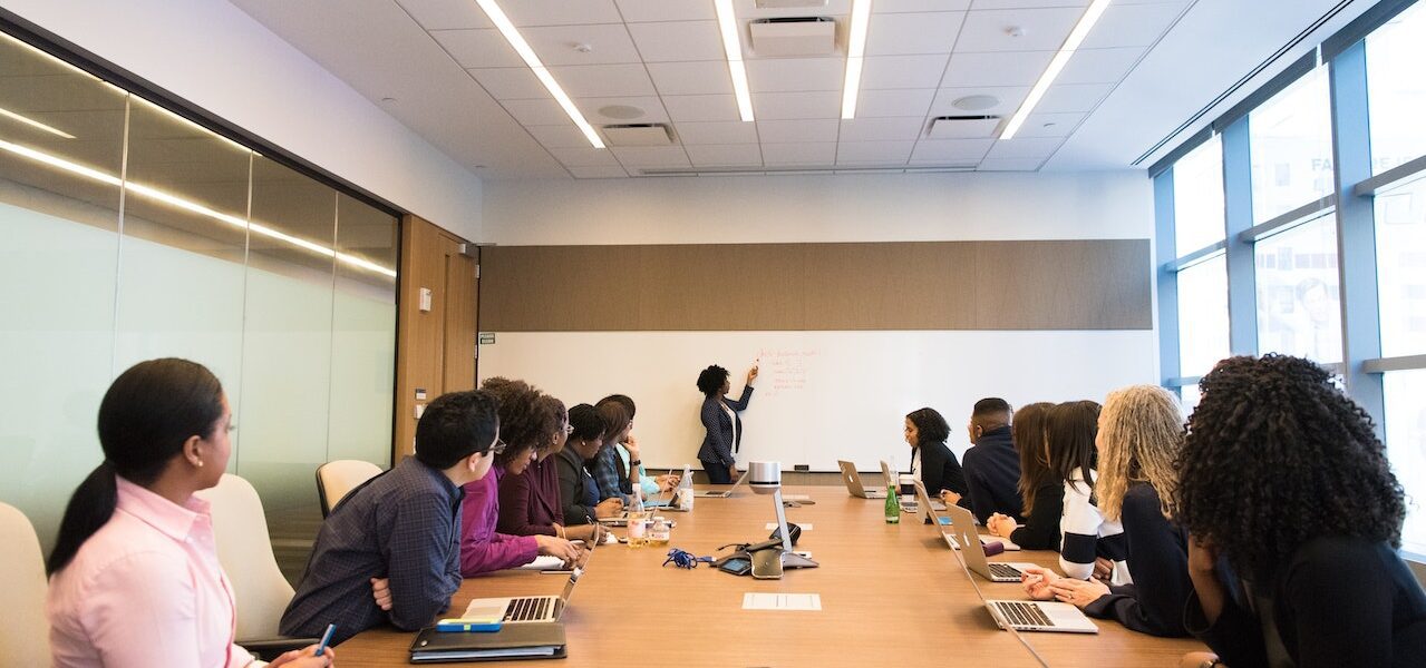 Ministers at a conference table discussing trade policies.